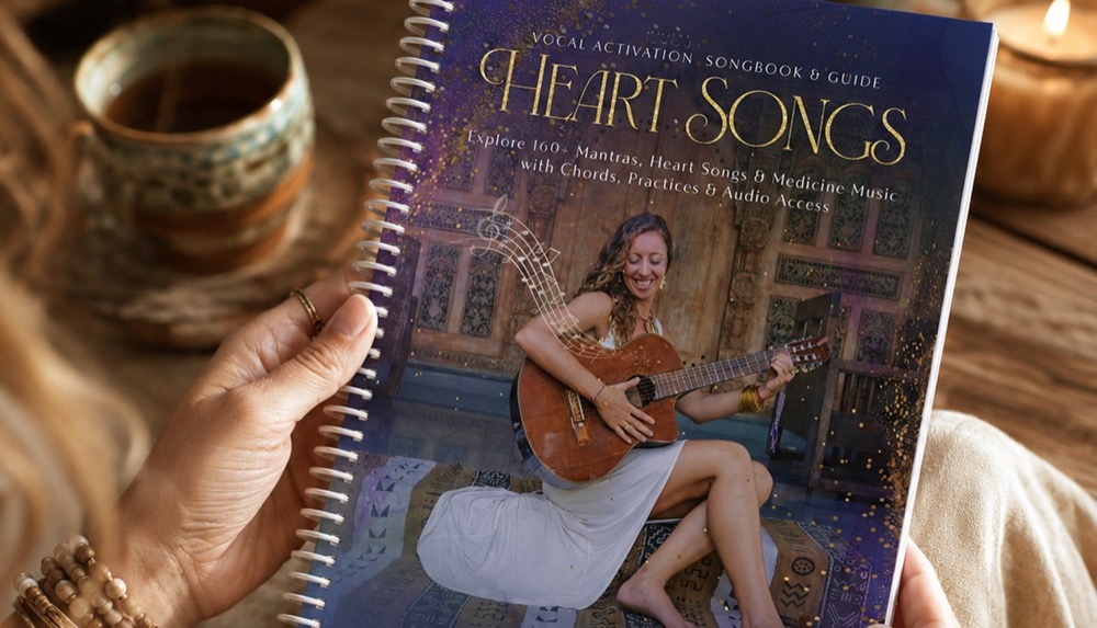 The HeartSongs Songbook held open